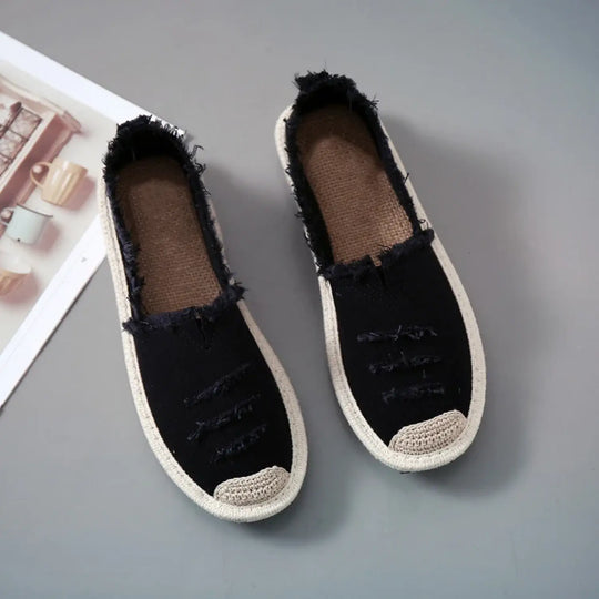 MODA gescheurde canvas stof zwart witte espadrilles