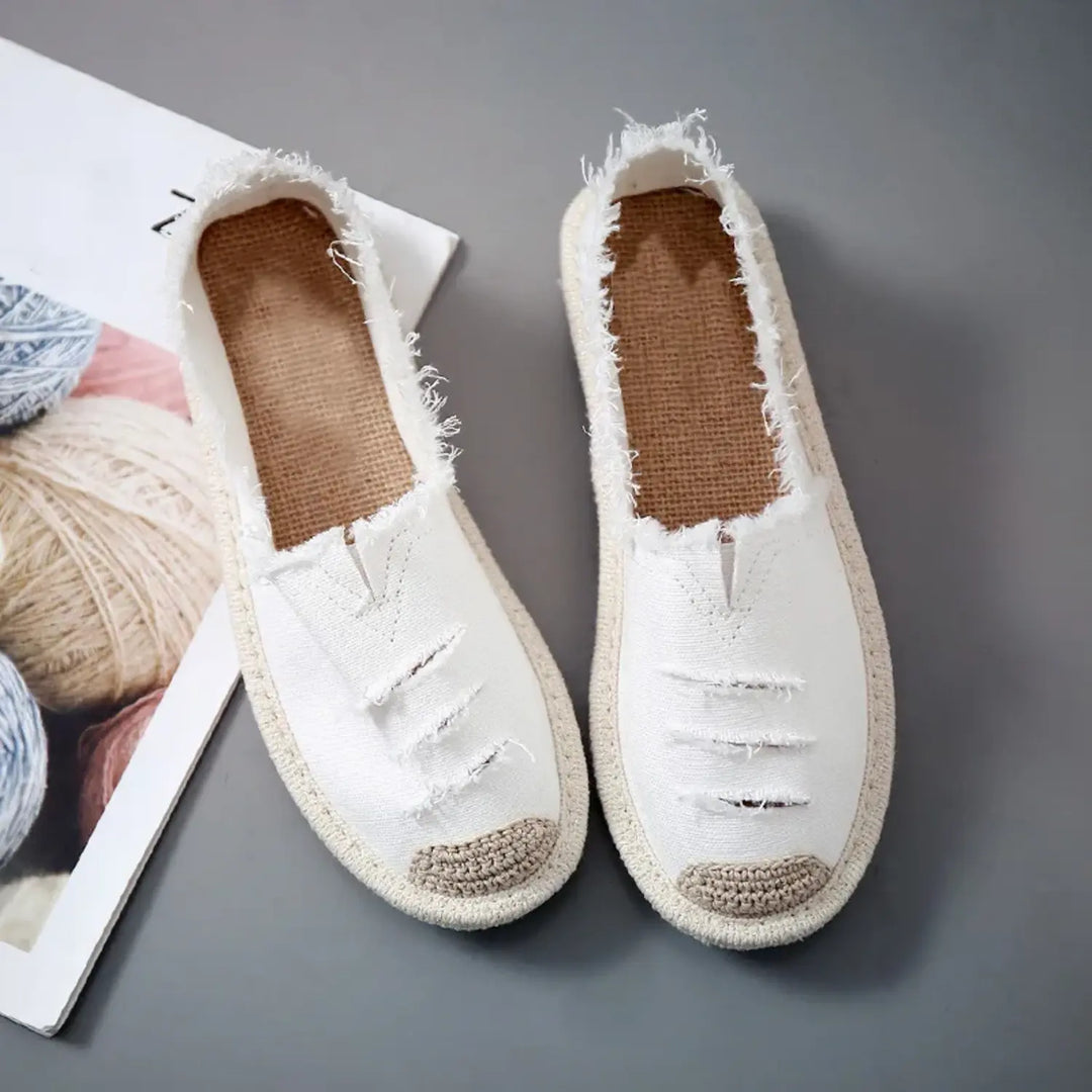 MODA gescheurde canvas stof zwart witte espadrilles